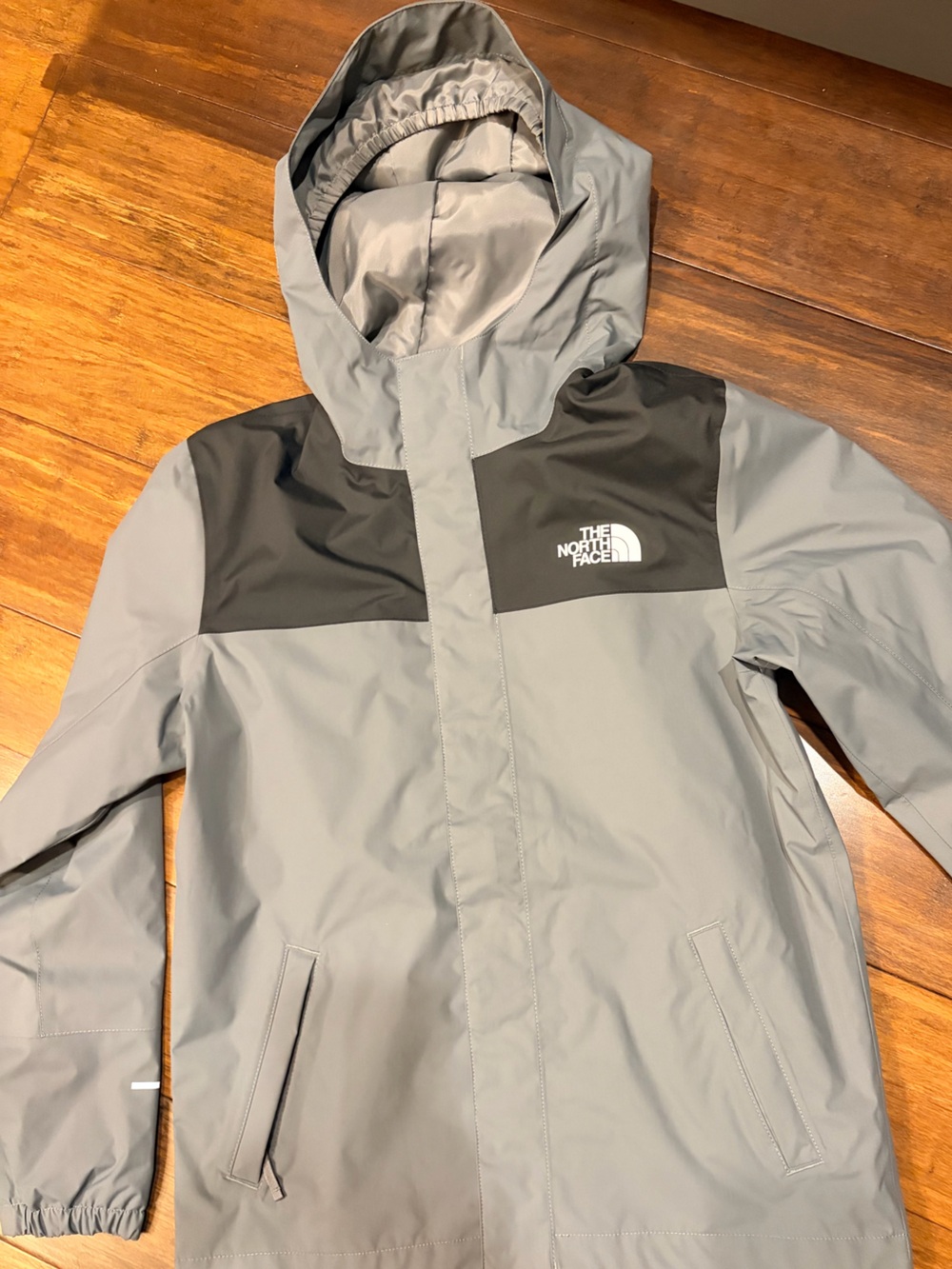 The North Face Gray and Black Kids' Raincoat with Hood
